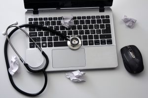 laptop, mouse, stethoscope